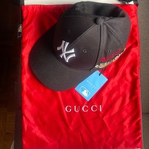 Gucci New York Yankees black base ball cap with moth patch on side. ( authentic)